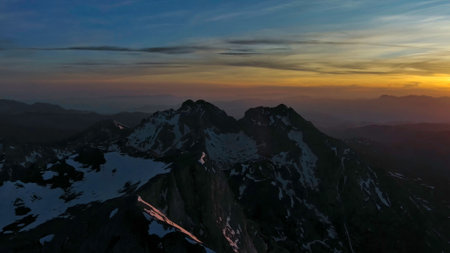 Aerial view of amazing rocky mountains in snow at sunset, Komovi, Montenegroの写真素材