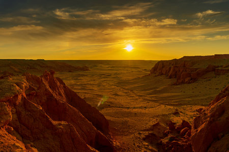 Bayanzag flaming cliffs at sunset in Mongolia, found in the Gobi Desert