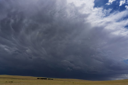 Storm clouds and mammatus clouds dramatic sky background