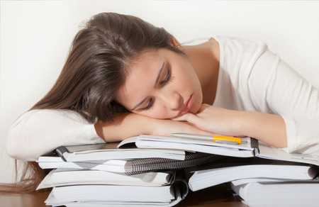 Young student girl sleeping の写真素材