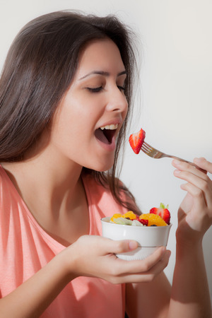 Young Girl and strawberryの写真素材