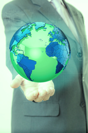 Businessman hand worldの写真素材