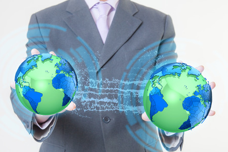 Businessman hand worldの写真素材