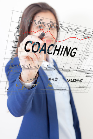 Woman pen touch coachingの写真素材