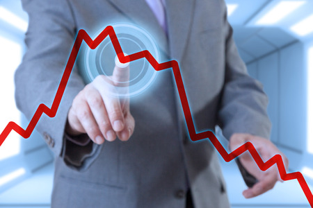 Businessman touch screen and chartの写真素材