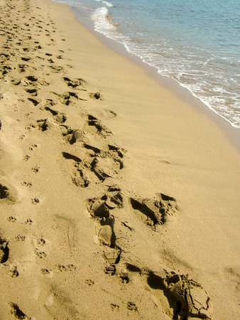 Beach sand and footprintsの写真素材