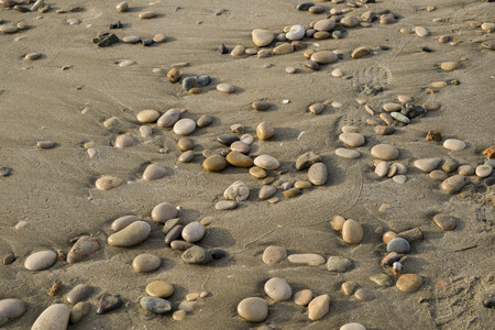 Stones and sand beachの写真素材