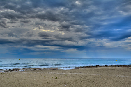 Sunrise on the beach in Spainの写真素材