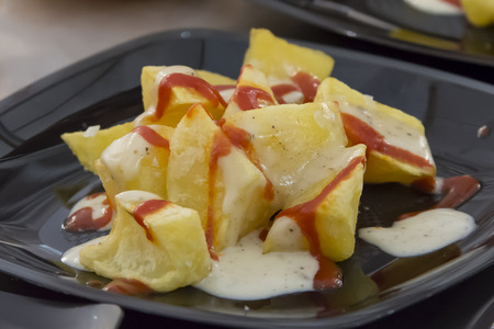 Typical Spanish tapa patatas bravasの写真素材