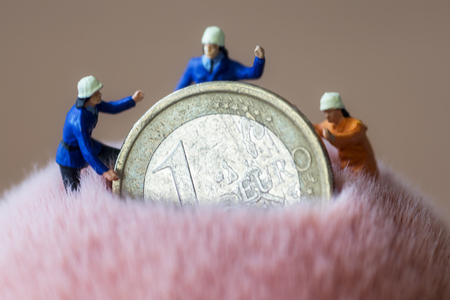 Mini workers and moneyの写真素材