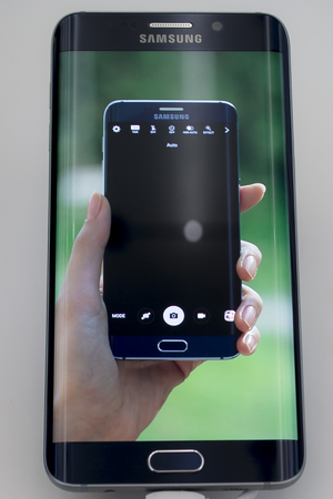 Mobile Samsung galaxy 6 Edge. Mobile World Centre. Barcelona, Spain. February 27, 2016のeditorial素材