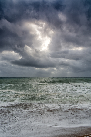 Sunrise on the beach and cloudsの写真素材