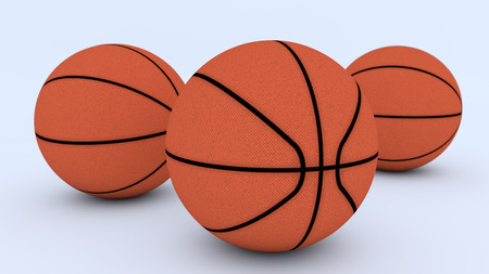 3D render. Three basketballs on the floorの写真素材