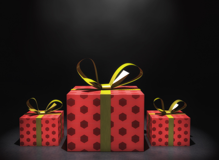 3d rendering. Three gift boxes and black backgroundの写真素材