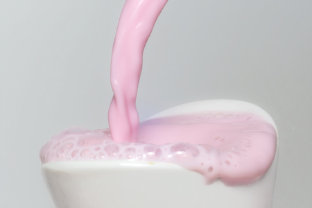 Milk splash macro backgroundの写真素材