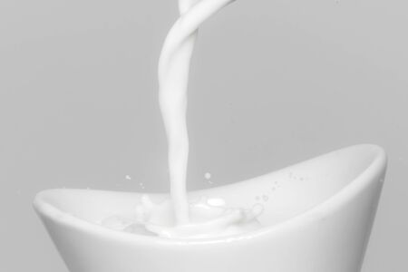 Milk splash macro backgroundの写真素材