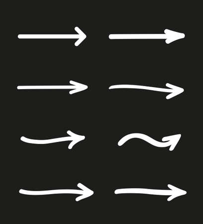 Hand drawn simple arrows. Set of different pointers. Abstract indicators. Black and white illustrationのイラスト素材