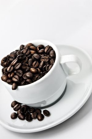 Coffee Beans in a Coffee Cupの写真素材