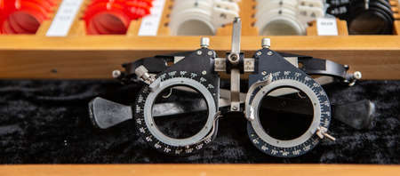 A set of test eyeglass lenses. means for diagnostics and correction of vision.The ophthalmologist box with lenses.の写真素材