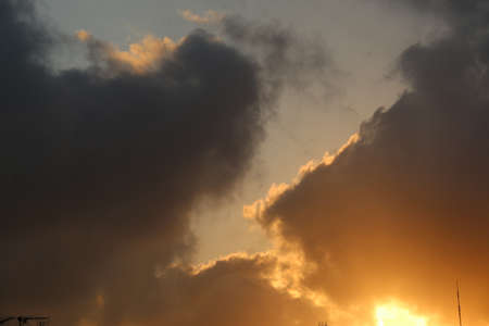 natural background with blue sky and white clouds at sunsetの写真素材