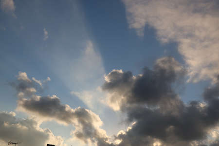 nature background with blue sky and white clouds at sunsetの写真素材