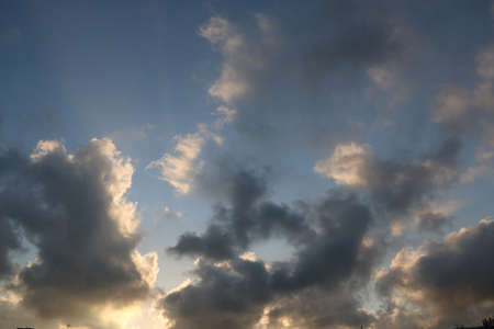 nature background with blue sky and white clouds at sunsetの写真素材