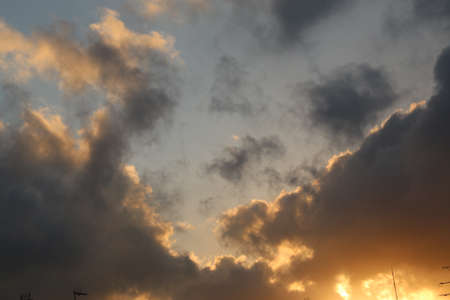 natural background with blue sky and white clouds at sunsetの写真素材