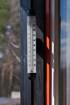 Outdoor thermometer near windowの写真素材