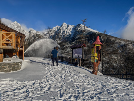 Snow cleaning with a large snow blower in the high tatras Slovakiaの写真素材
