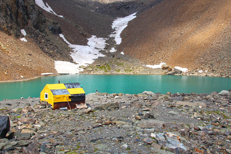 Hut at the mountain lakeの写真素材