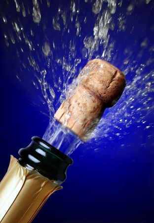 Close up of champagne cork poppingの写真素材