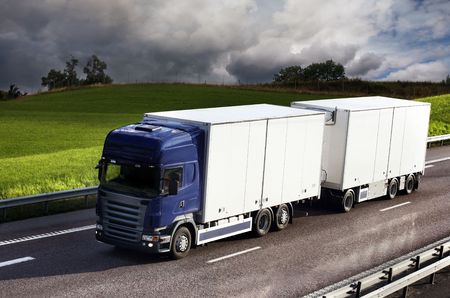truck driving on country-roadの写真素材