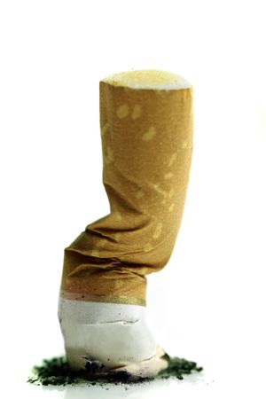 Close up of cigarette on whiteの写真素材