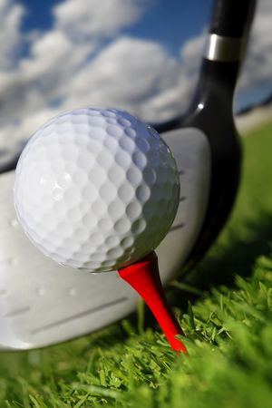  Golf club and ball in grassの写真素材