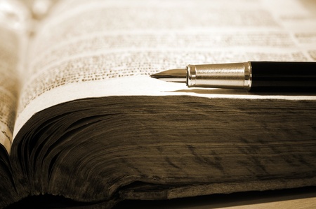 Old book and penの写真素材