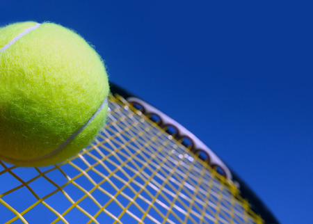 Ball and Racket against  blue sky