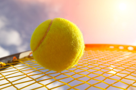 Ball and Racket against  skyの写真素材