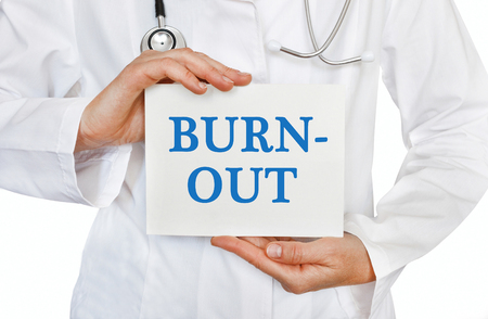 Burn Out card in hands of Medical Doctorの写真素材