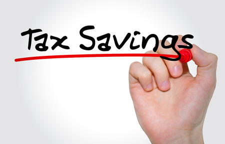 Hand writing inscription Tax Savings with marker, conceptの写真素材