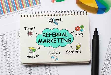 Notebook with Toolls and Notes about Referral Marketingの写真素材