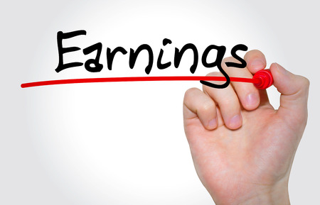 Hand writing inscription Earnings with marker, conceptの写真素材