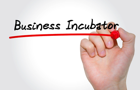 Hand writing inscription Business Incubator with marker, conceptの写真素材