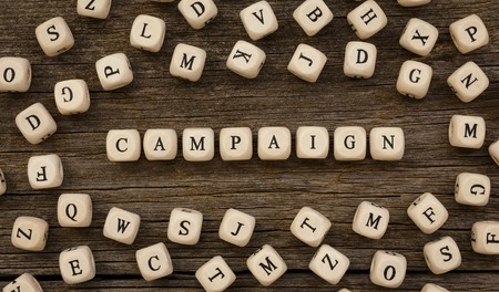 Word CAMPAIGN written on wood blockの写真素材