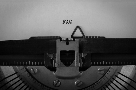 Text FAQ typed on retro typewriterの写真素材