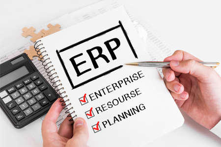 Businessman Writing ERP Concepts on his Note.の写真素材