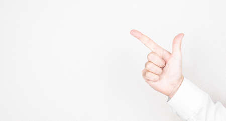 Businessman pointing copy space with his hand.の写真素材