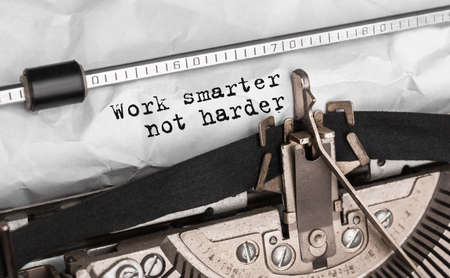 Text Work smarter not harder typed on retro typewriterの写真素材
