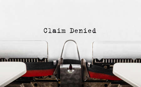 Text Claim Denied typed on retro typewriterの写真素材