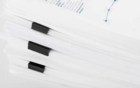 Stack of report financial documents Concept of business and search.