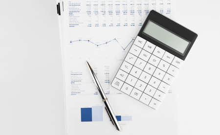 Calculator on financial statement and balance sheeet on desk of auditor. Concept of accounting and audit business.の写真素材